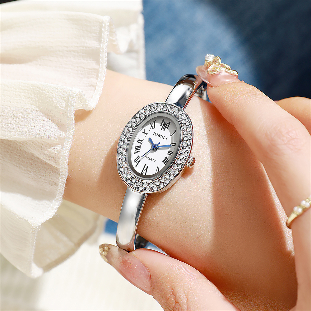 Jewelry Diamond Watches - Neue ovale Damen-Armbanduhr mit vollbesetztem Diamantenbesatz,